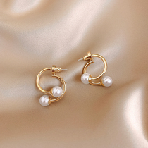 Korean cross pearl earrings female 2021 New Tide style temperament advanced design sense light luxury silver earrings