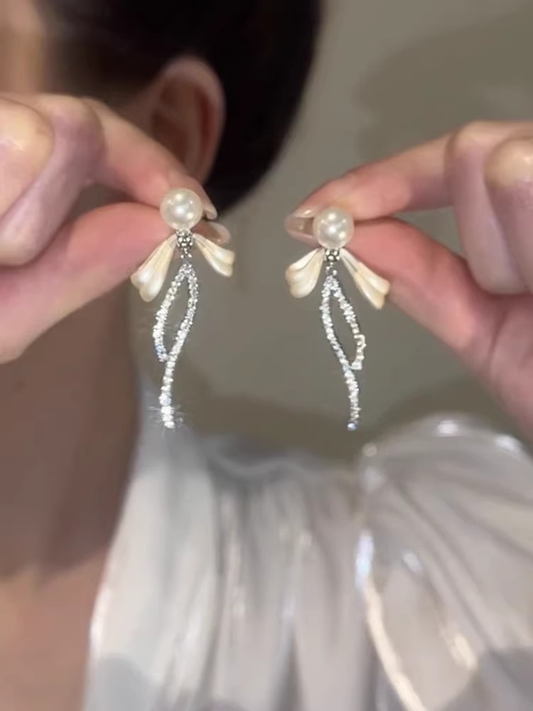 珍珠蝴蝶结流苏耳环女2025新款爆款锆石耳钉轻奢高级感小众设计