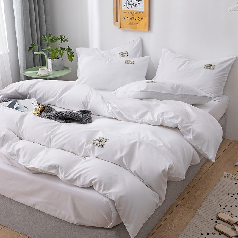 Bed with seven pieces of bed packed with white bed linen with core pillow core, full suite of six pieces