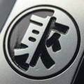 东来军火库二手店的LOGO