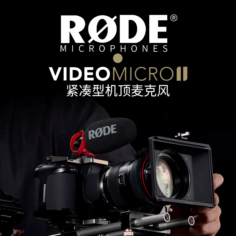 Камера SLR с микрофоном RODE Rhodes VideoMicro II, указывает на сексуальный микрофон радиоуправляющее колесо