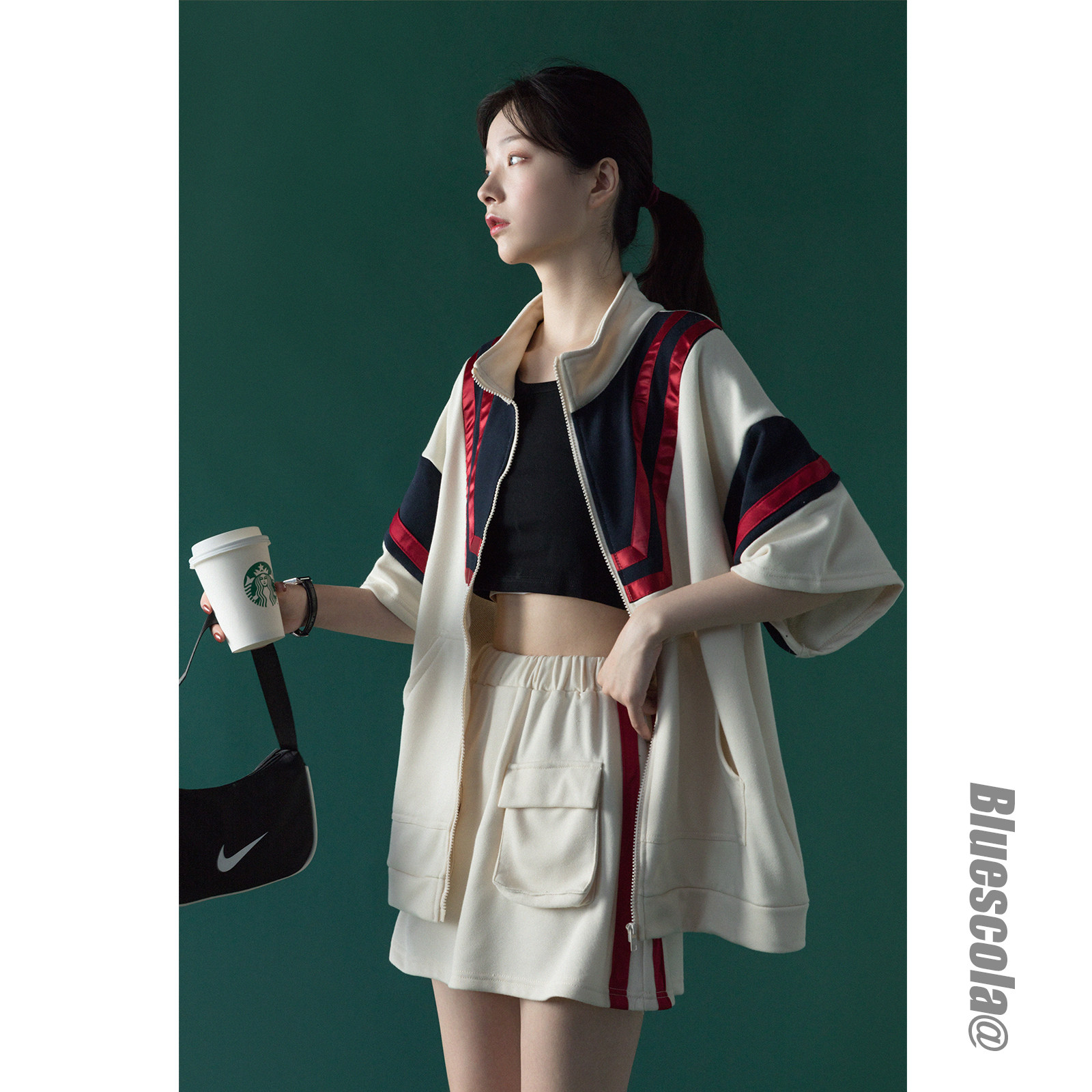 Sports suit women's summer 2021 new casual two-piece Korean loose cardigan jacket wild A-word short skirt