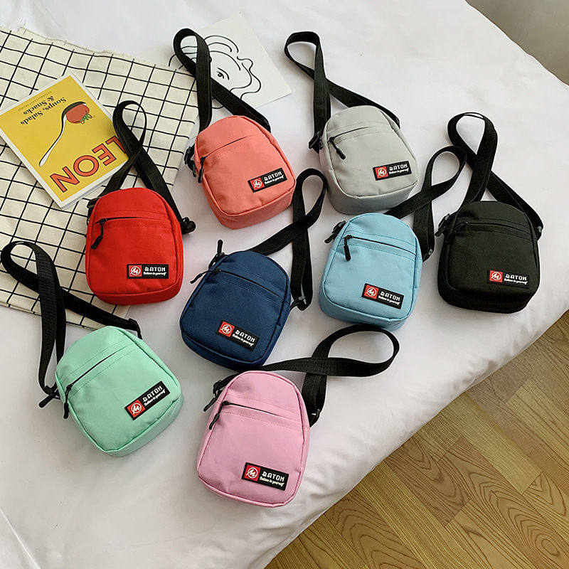 Mobile phone bag small bag male 2020 new trendy messenger female bag student net red all-match small shoulder bag mini canvas bag