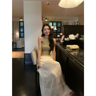 pusumede's gentle and charming cut-out knitted skirt is a feminine A-line dress with a hint of vacation style