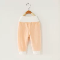 Оранжевые цветные штаны, высокая талия