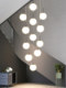 Staircase chandelier long chandelier loft duplex light luxury modern minimalist villa living room overhead rotating stairwell lighting