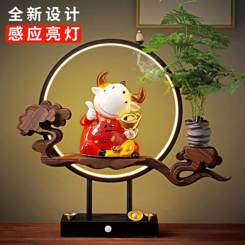 Creative modern Year of the Ox gift decorations automatic induction TV cabinet living room entrance simple housewarming home ornaments