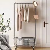 Посадка вешалки в спальне подвешивает вешалку, мобильная легкая роскошная высокоуровневая угловая стойка для хранения для хранения полки на ночь на ночь