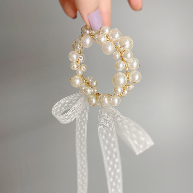 Wedding wedding bride Sen Department bridesmaid wrist flower sister group pearl hand chisel small fresh dance hand flower wedding