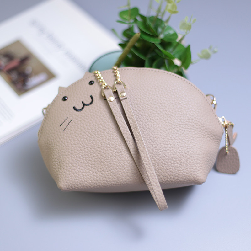 2021 Japan-ROK new headlining cow leather creative skew cross single shoulder chain bag small crowding temperament New wave female bag mobile phone bag
