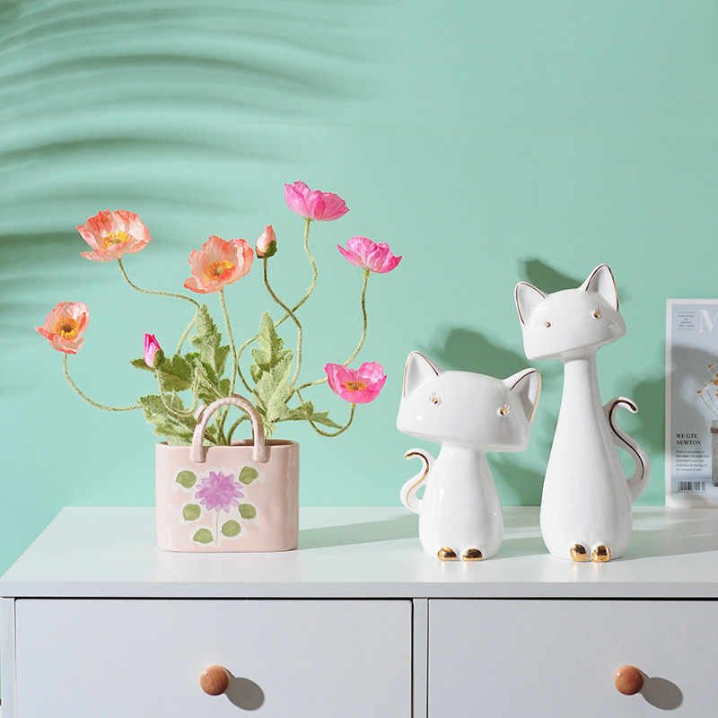 Net red bag vase decoration flower arrangement ins style living room ceramic handbag decoration storage small flower blue flower device