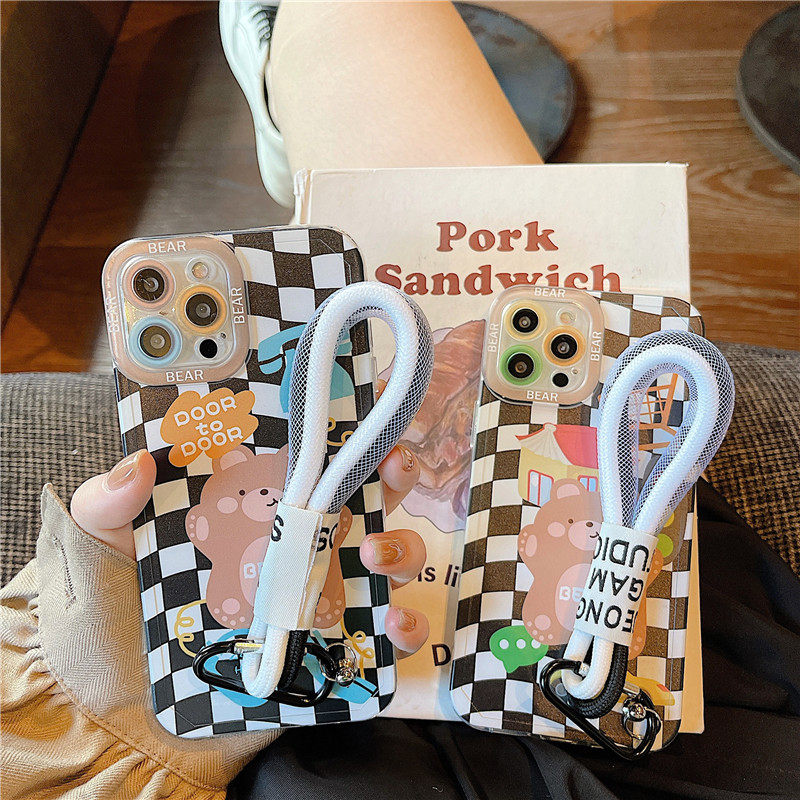 Japan-ROK black and white plaid sending hand hanging rope applies iPhone12 13promax Apple 11 mobile phone protection shell xs xr new xsmax network red 7p creativity 8plu