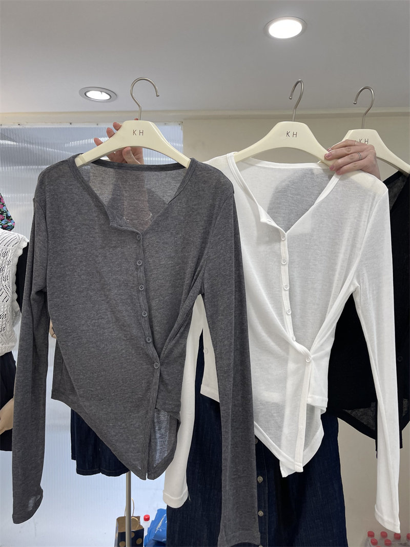 KH Korea 2023 spring and summer new casual 100 hitch design feeling thin and inclined button long sleeve knitted cardigan with female blouses 