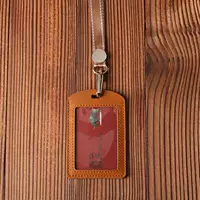 Широкая веревка темно -коричневого цвета