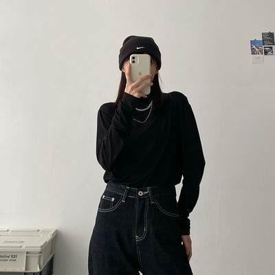 A black long-sleeved T-shirt for women weighing 2-300 pounds in extra-large size, new style for early autumn 2022. It has a semi-high neck and can be worn as a base layer
