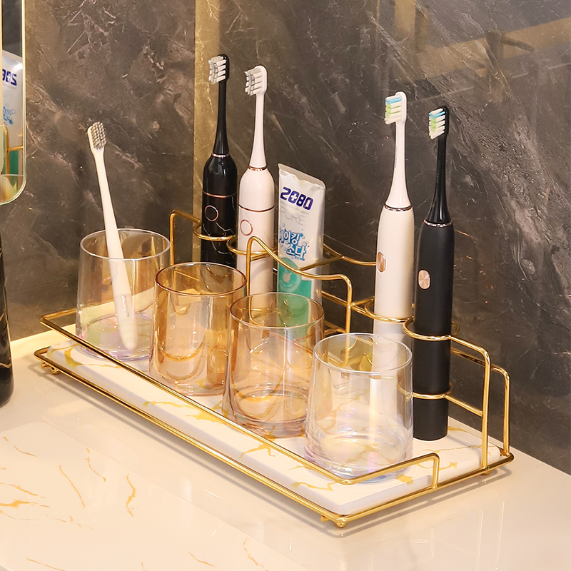 Light luxury stainless steel electric toothbrush rack home four-port bathroom powder room suction wall-mounted wash storage rack