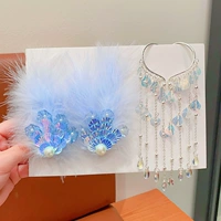 Звездные синие бусины+уши раковины висят 3 штуки