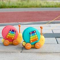 Knock on the piano snail educational ejection snail rope drag baby toddler small multi-functional toy toy infant stroller