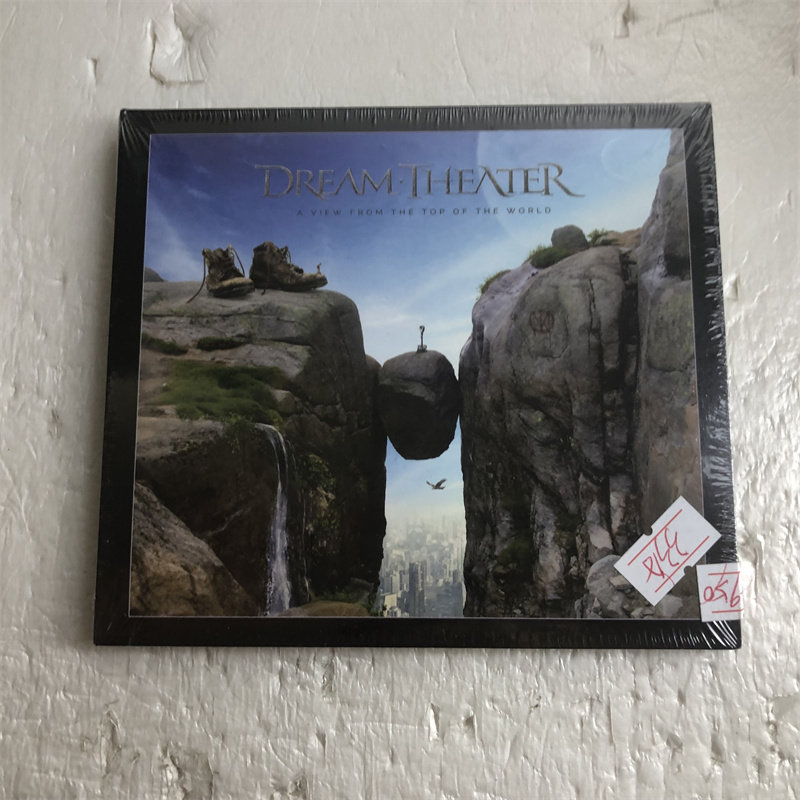 Новая версия нераспечатанного Dream Theater Театр грез- Вид сверху на компакт-диске Изображение 1