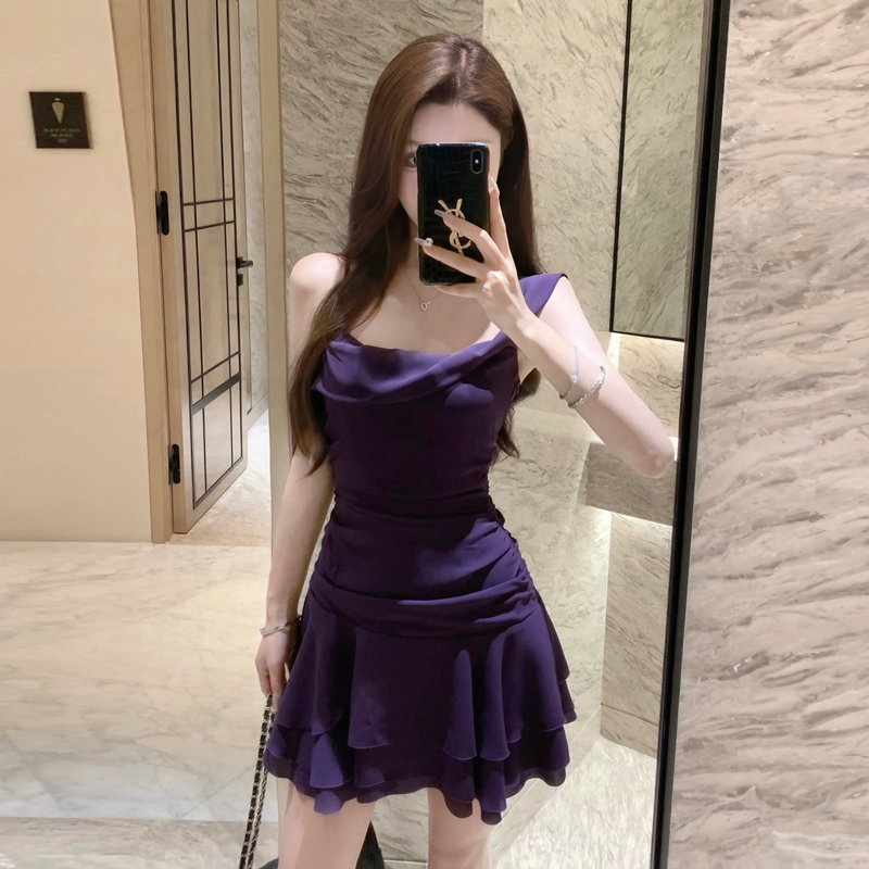 A Stylish and Elegant Purple Spaghetti Strap Dress with a Unique and Beautiful Design, Perfect for Summer