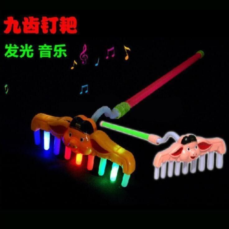 Zhu Bajie's rake street stall night market Zhu Bajie pork chop nail rake light music rake Journey to the West children light