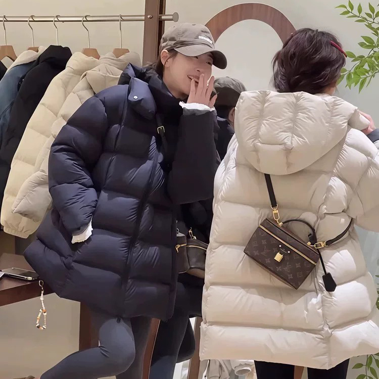 25 New Styles of Women's Mid-Length Hooded Thickened Warm White Duck down Puffer Jacket, Fashionable and Versatile 25 New Styles of Women's Mid-Length Hooded Thickened Warm White Duck down Puffer Jacket, Fashionable and Versatile