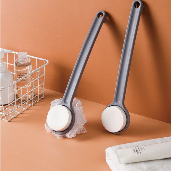 Applying medicine on the back Applying medicine on the back Applying lotion tool on the back Applying body lotion