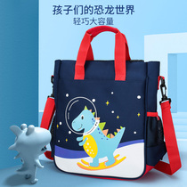 A handbag for primary school students to go to school with a handbag carrying book bag male and female child mesh red katun childrens diagonal satchel bag