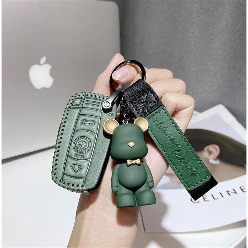 Suitable for BMW key cover new 3 series 320i folding BMW X1 X3 5 series leather case buckle cute hanging