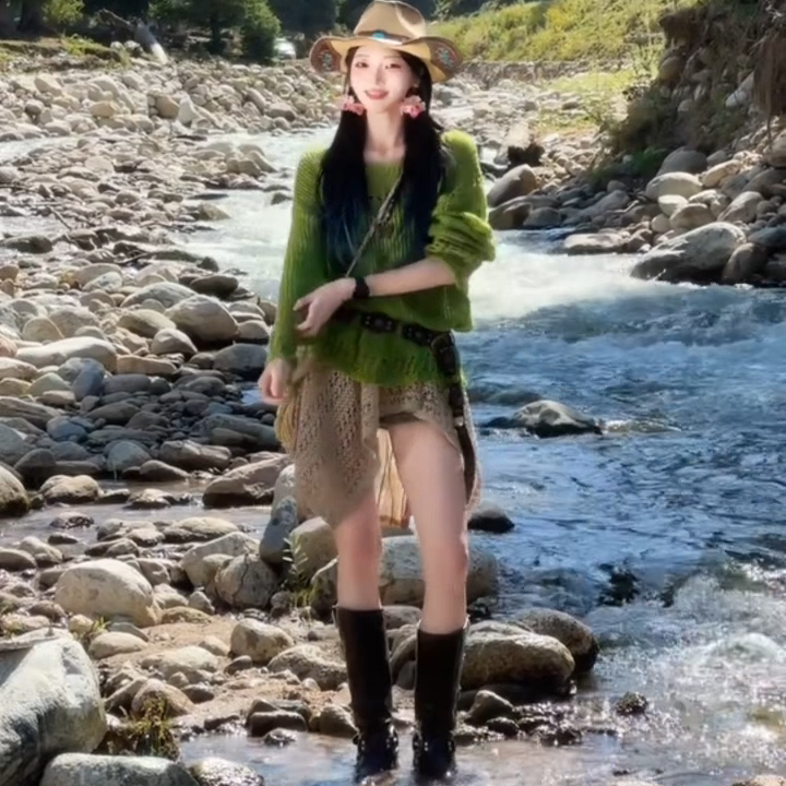 Xinjiang's Northwest Grassland Early Autumn Popular Outfit: Green Sweater with Hollow-Out Short Skirt, 2025 New Style Stunning Set