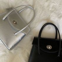 CKGR MKins Korean niche design fashionable silver and black handbag 2024 new oil wax leather high-end single