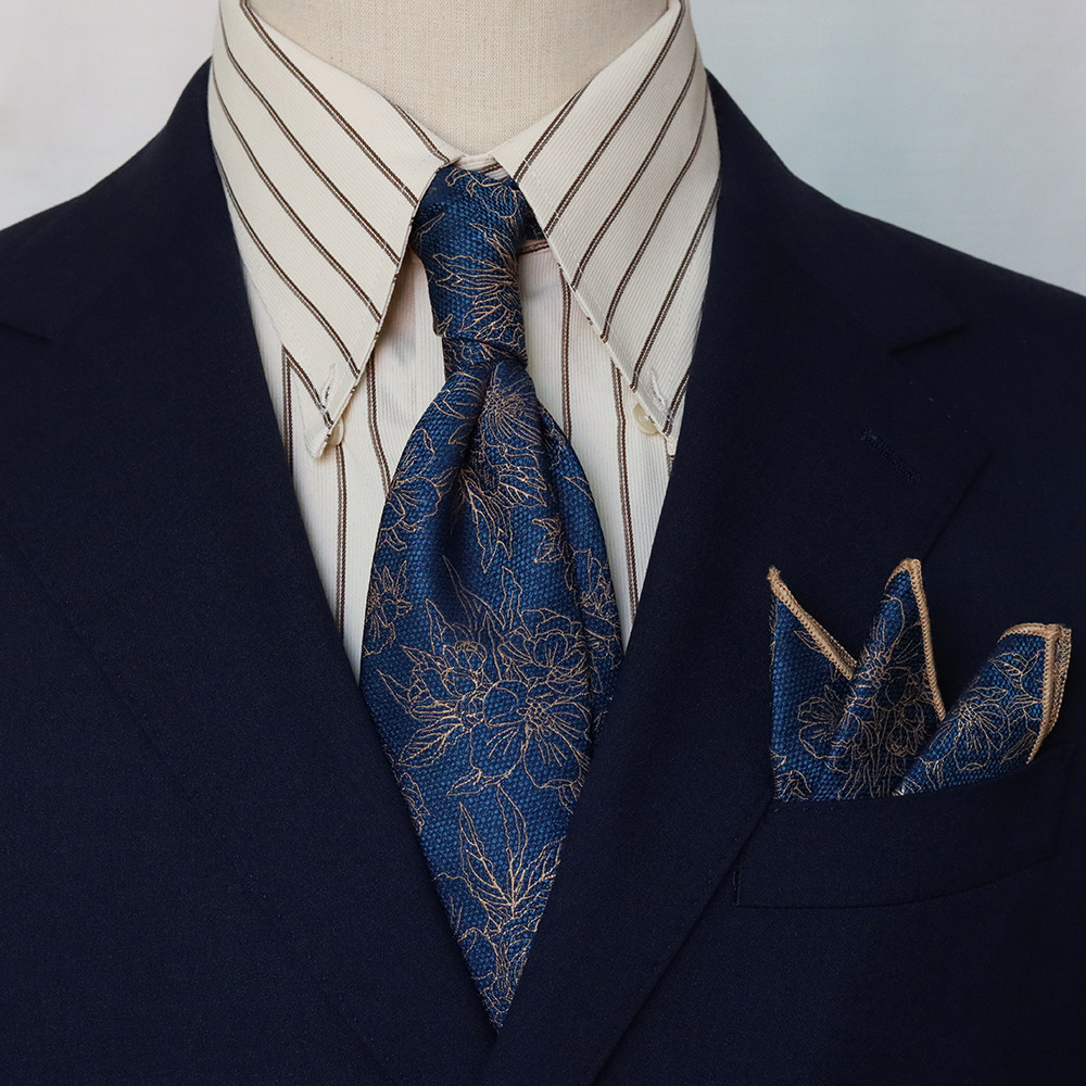 Men's retro blue-brown patterned tie, perfect for weddings, business attire, and formal wear; hand-tied for a sophisticated look.
