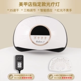 Руки с ноглером красная световая сухой светотерапевтическая машина для ногтя.