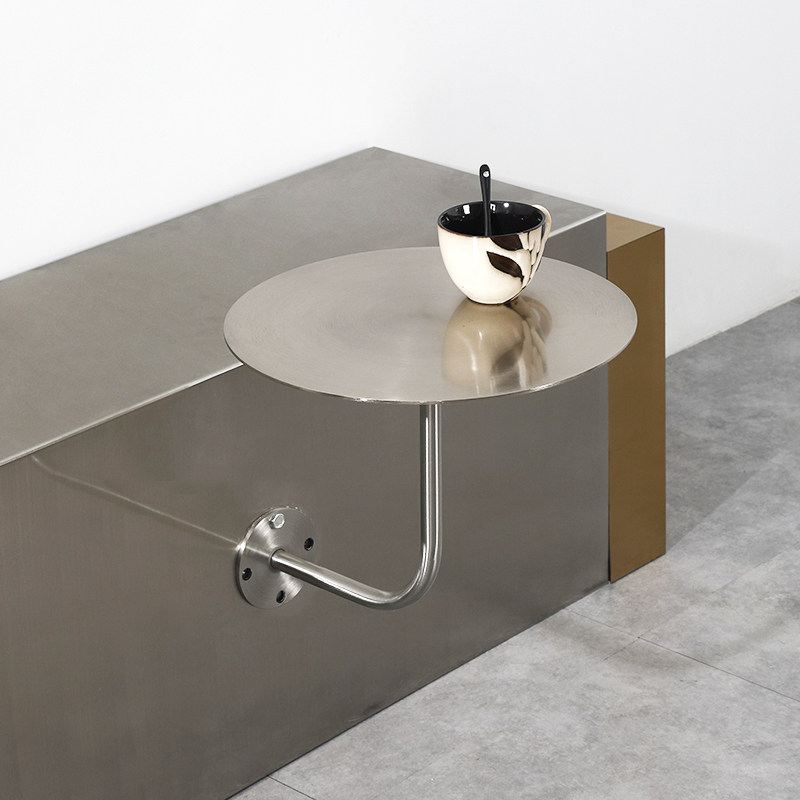 Modern minimalist milk tea shop cafe net red style wall-mounted stainless steel small round table against the wall hanging table card seat table