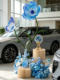 4S Store Car Delivery Ceremony Decoration with Blue Artificial Flowers, Fake Flower Arrangements, Flower Path Decorations, and Ambiance Scene Setup