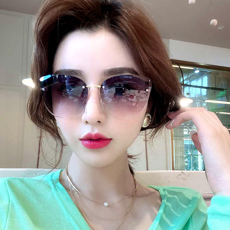 Sunglasses women's summer sunscreen fashion personality net red same style high-end frameless edge-cut glasses anti-ultraviolet sunglasses