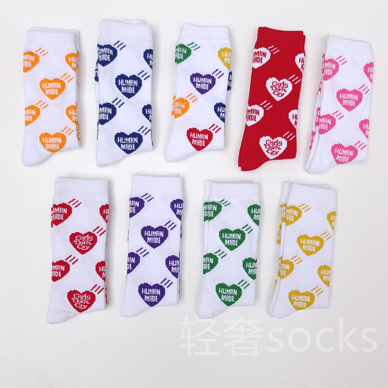 Spot HUMAN Japanese version of color love medium and high tube sports cotton blended ins street net red men's and women's tide socks