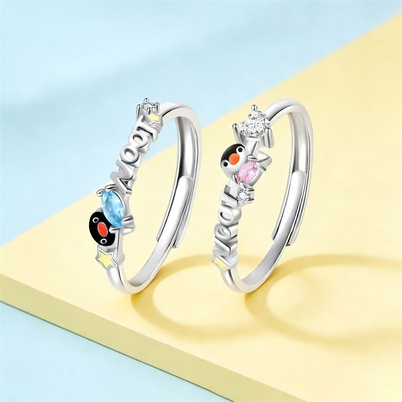 Cartoon childlike little penguin ring cute couple