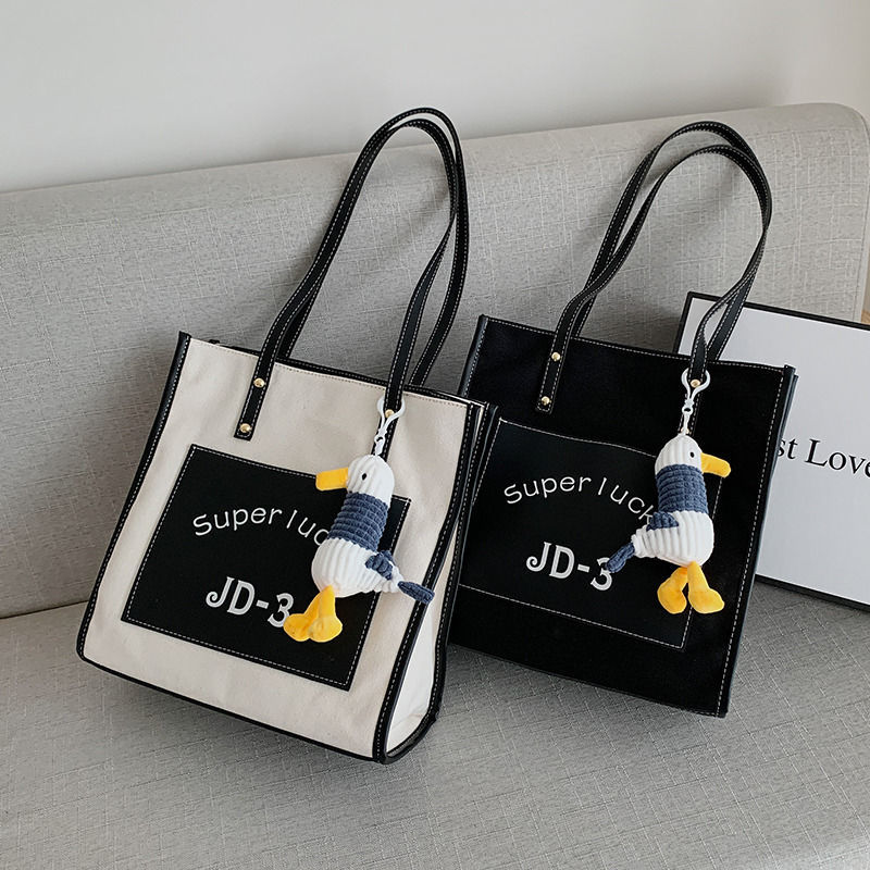 Canvas Single Shoulder Bag University Students Class Bag Large Capacity Big Bag Woman 2021 New Korean version Hit Color Commuter Bag