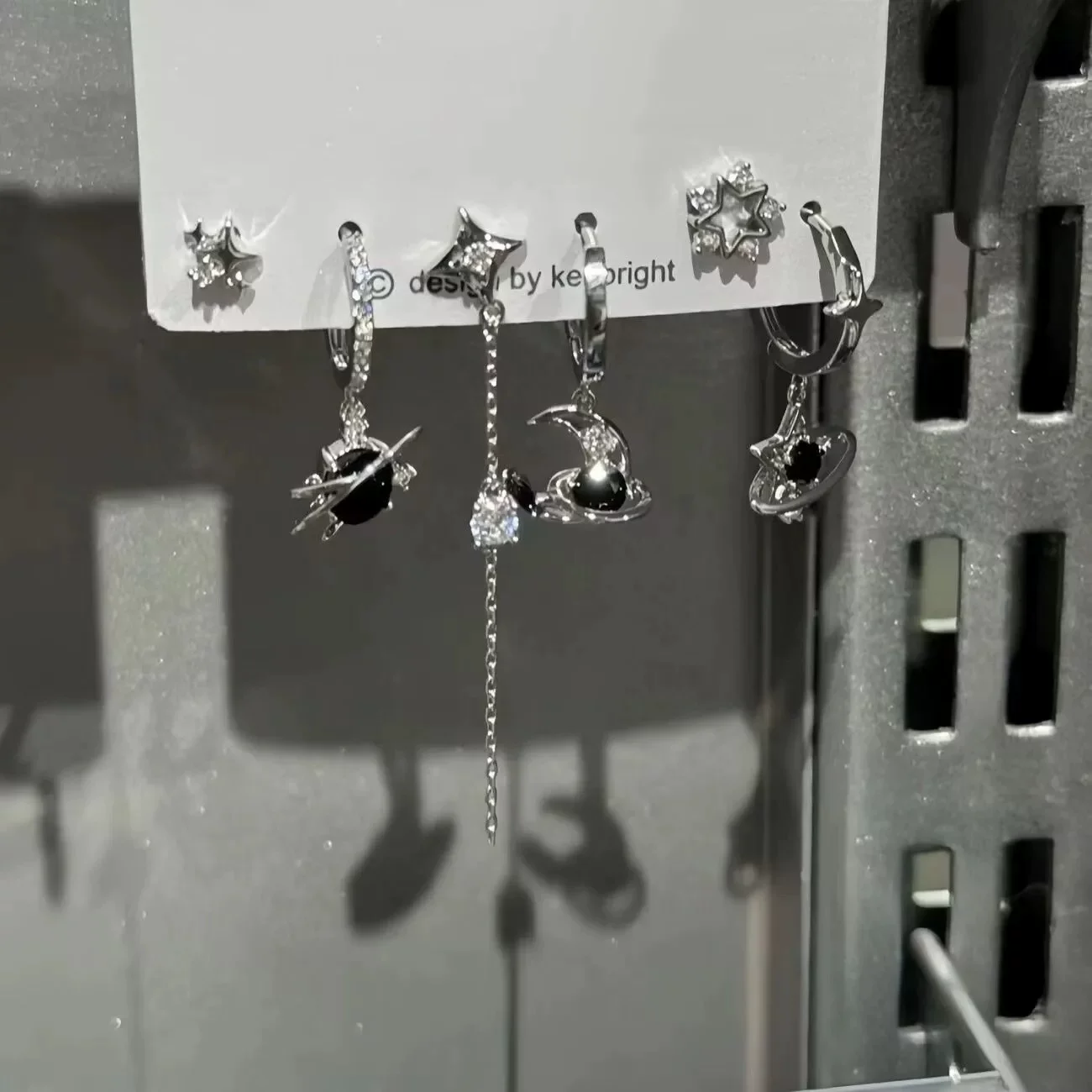 Set with zircon, small design earrings