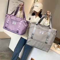 Travel bag female short-distance portable portable waterproof luggage bag large capacity storage luggage bag travel travel waiting bag