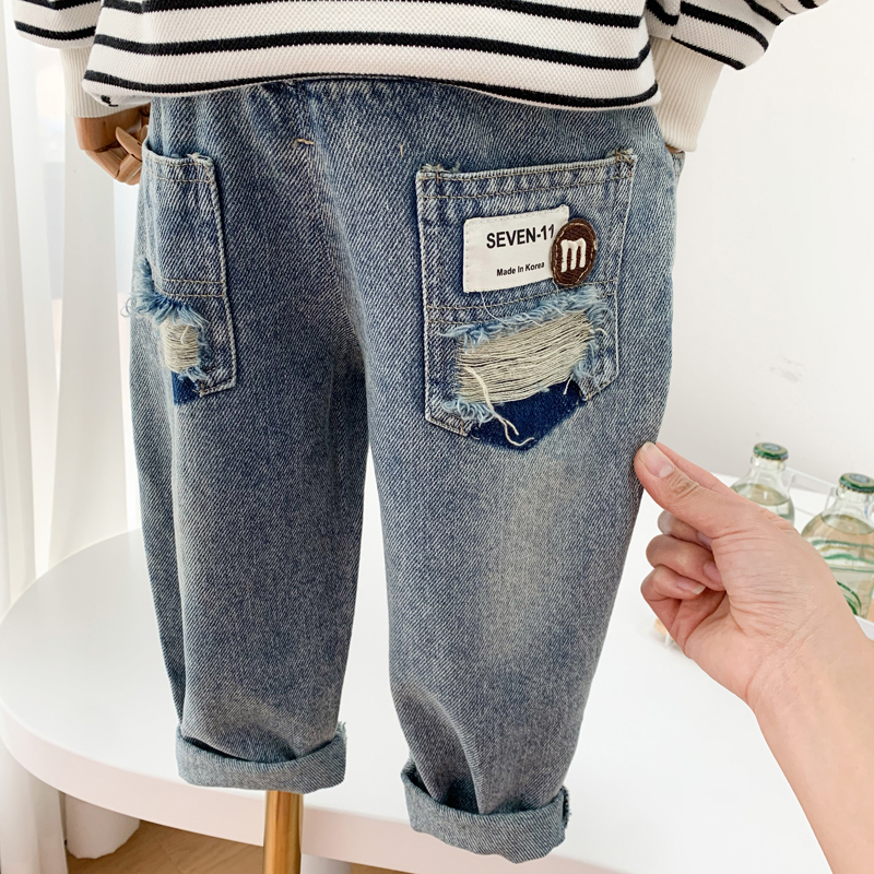 Boys' ripped jeans 2023 new Korean version of children's foreign style soft pants for children fashionable old pants trend
