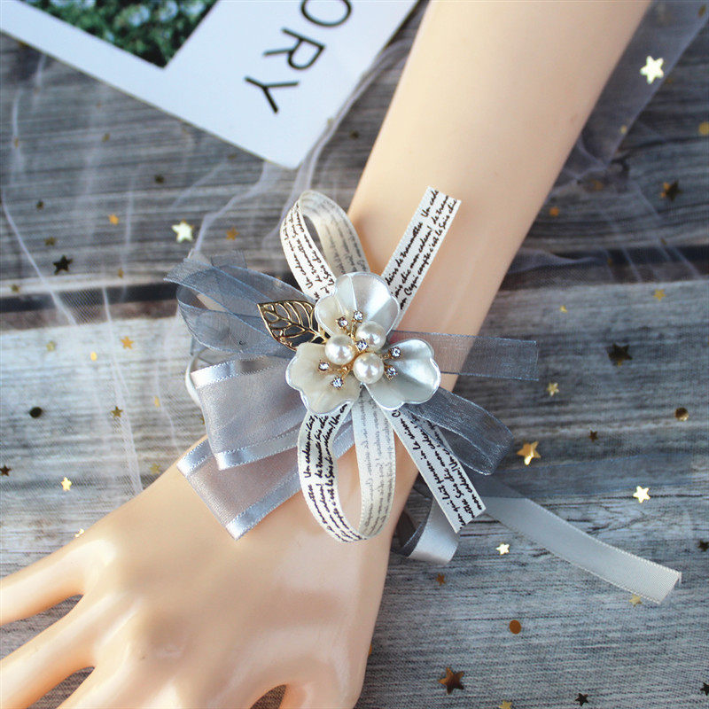 Bridesmaid wrist flower bride sister hand flower wedding small fresh super fairy Sen pearl Korean wedding bracelet jewelry