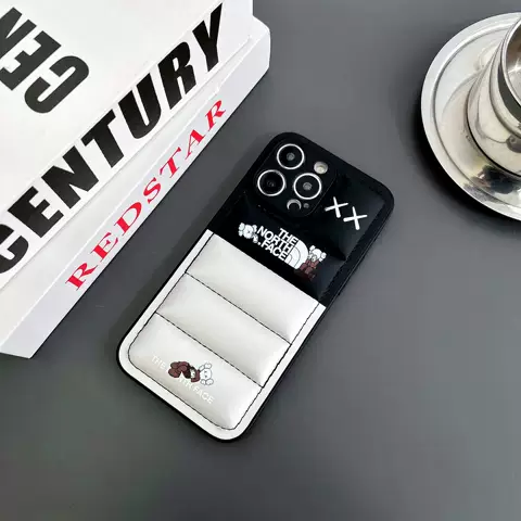 KAWS The North Face Phone Cases Covers Puffy Puffer Down Jacket Trendy Fashionable Plus/Pro/Max – iPhone 16, iPhone 15, iPhone 14, iPhone 13, iPhone 12