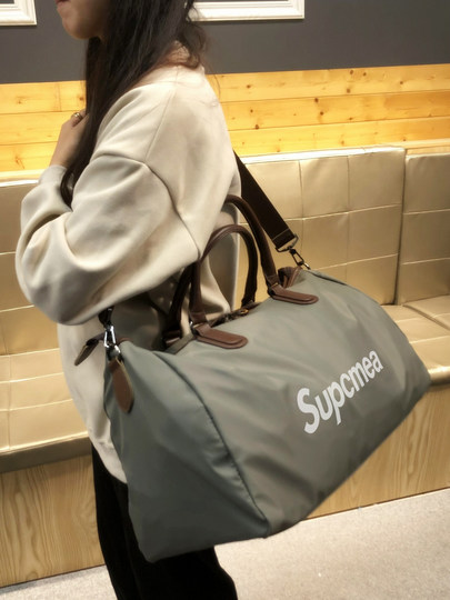 Hong Kong brand large capacity bag 2025 new oversized handbag travel lightweight luggage bag business trip portable bag