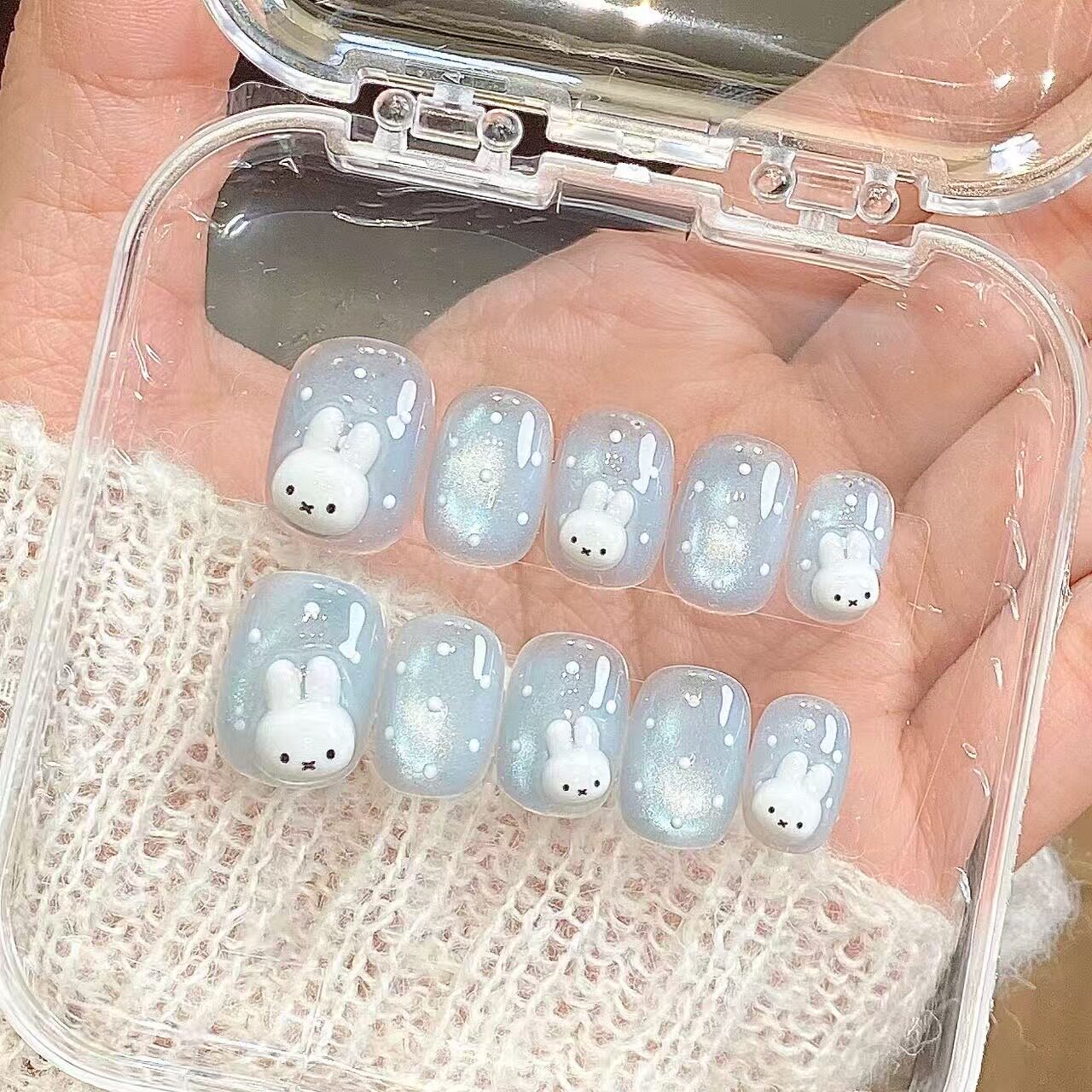 Cool and icy blue cat eye three-dimensional rabbit wearing nail cute sweet girl short white daily pure handmade manicure