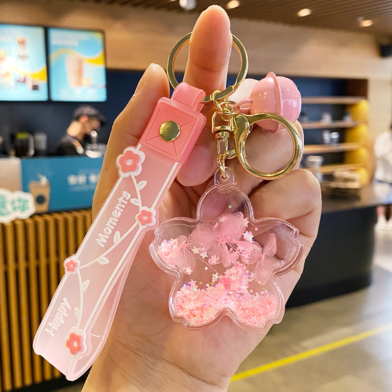 2025 Creative Small Pendant Personalized Oil Flowing Sand Flower Keychain for Women, Exquisite Children's Student Backpack Decoration for Men