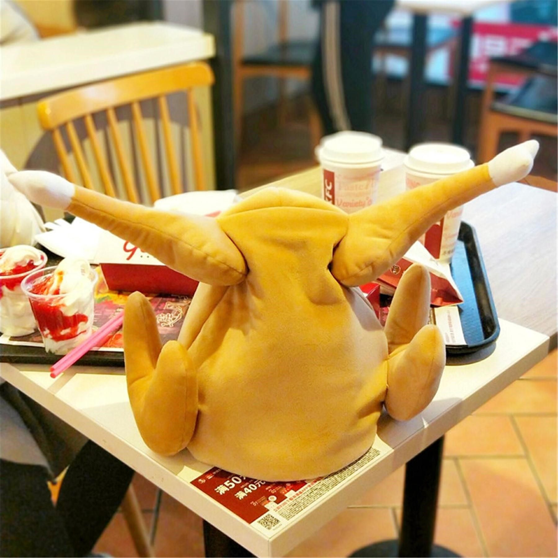 Qin Xiaoxian with a moving chicken leg hat shaking sound net red toy electric turkey hat can dance funny spoof