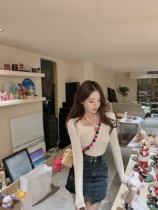 Minimalist design sense strap hollowed-out blouse 2022 early spring new Korean version sashimi with short long sleeves bottom-shirt woman