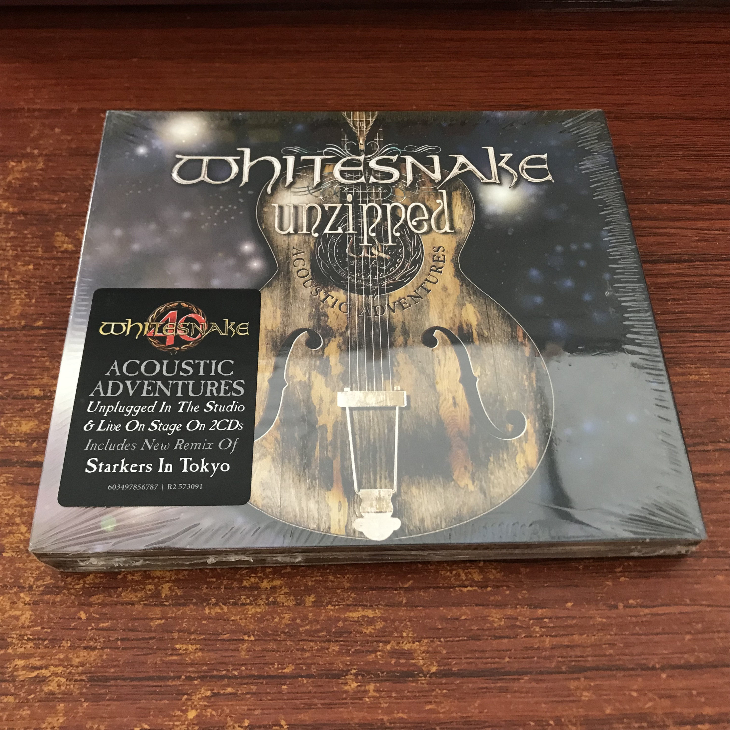 Глэм-рок-группа White Snake Whitesnake разархивировала совершенно новый нераспечатанный компакт-диск Изображение 1